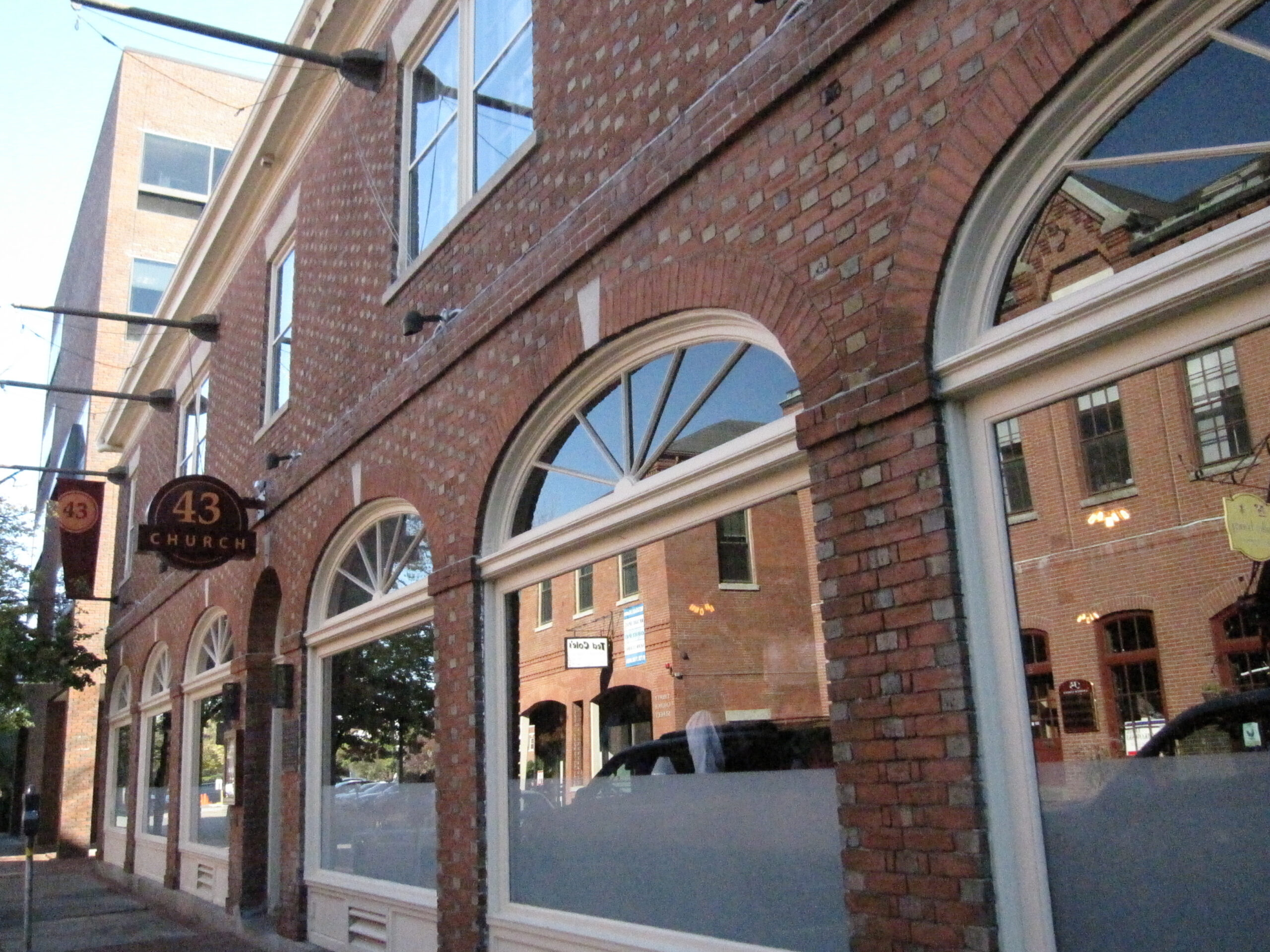 The brick front of Lyceum Hall, now Turner's Seafood, with arched windows