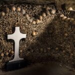 Skulls and Cross inside the Paris Catacombs