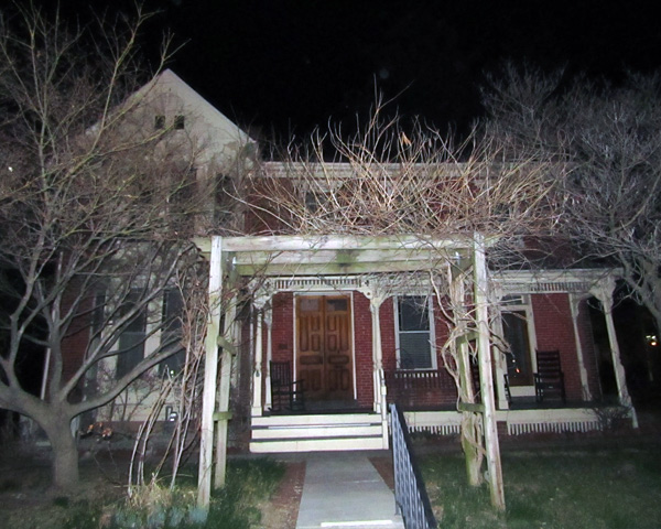 Front of the Welty House at night