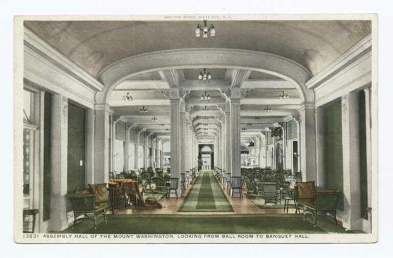 A long hall with columns, chandeliers and wicker chairs, in a hand-colored postcard