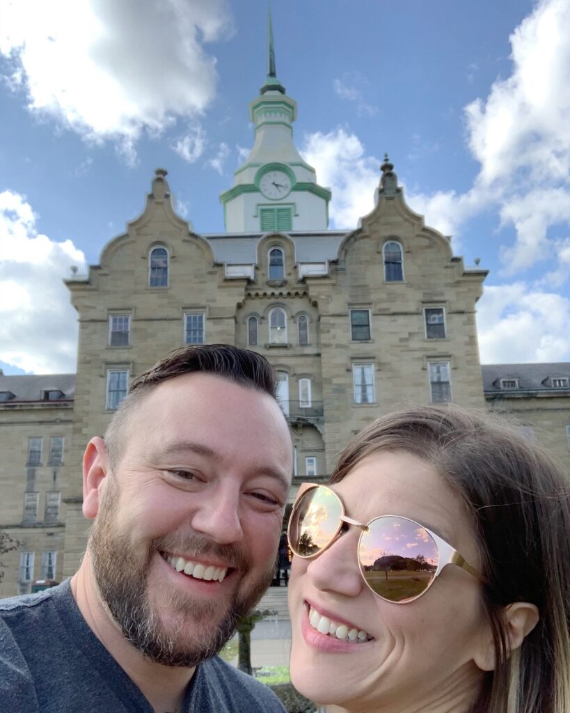 Harry and Leigh Anne Kautzman in front of the Trans-Allegheny Lunatic Asylum.