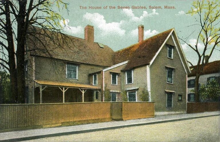 Early 1900s postcard of the House of the Seven Gables, a dark many-gabled wooden house