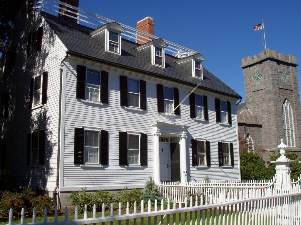The white Ropes Mansion on Essex Street behind its picket fence