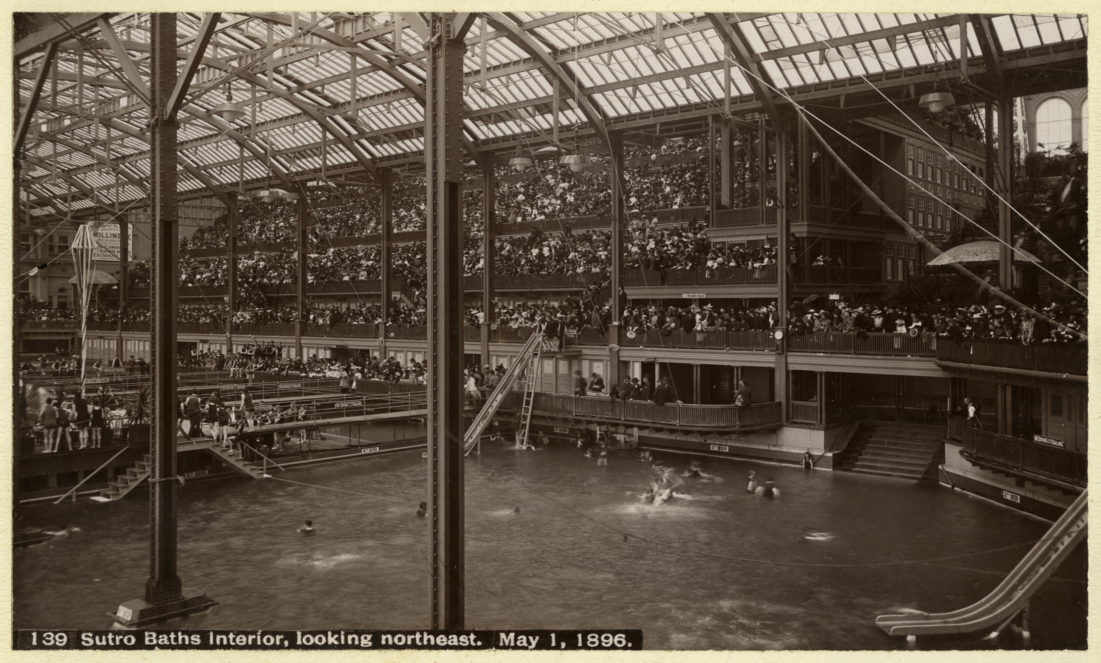 The glass-roofed interior of Sutro Baths in 1896, with its pools and galleries
