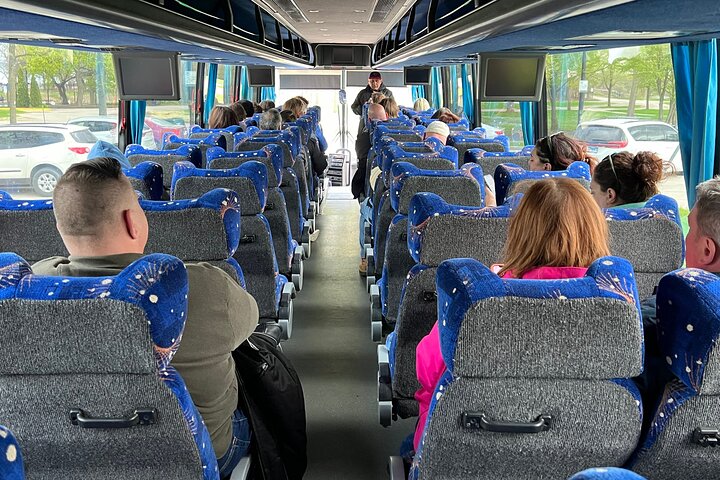 On the Devil In The White City luxury coach bus