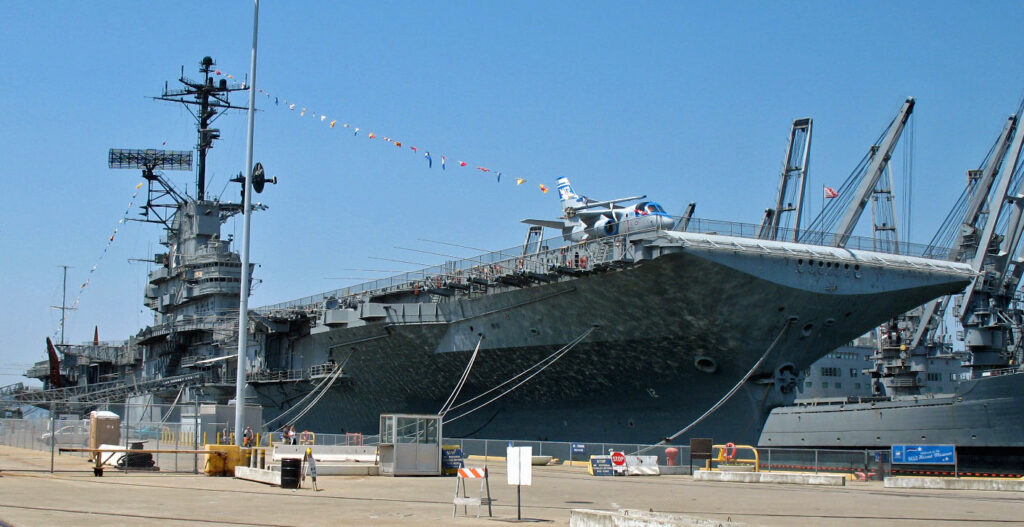 The aircraft carrier USS Hornet moored at its pier in Alameda as a museum ship